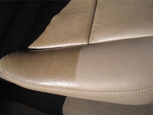A tan leather car seat cleaned and conditioned to a soft natural finish.